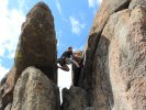 Scaling rocks while rock climbing in Colorado